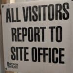 All visitors report to site office sign